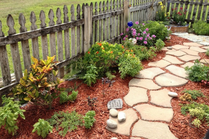 Light colored mulch for a flower bed