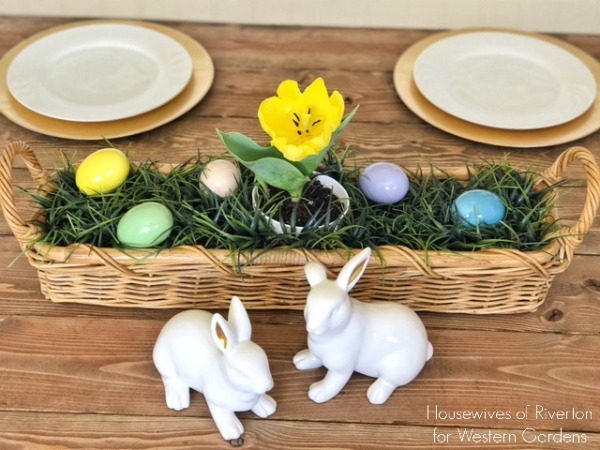 Easter table centerpieces with tulips and ceramic bunnies
